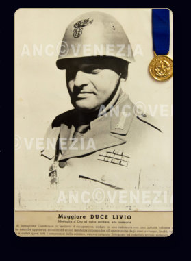 M.O.V.M. del Magg. CC. reali Livio Duce con fotografia